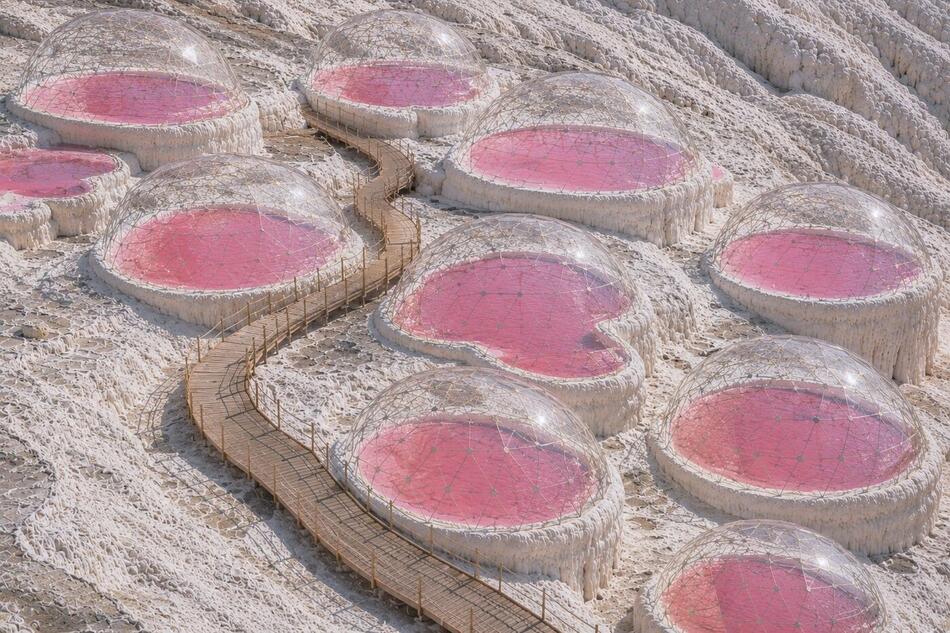 Rendering of pink mineral pools in white travertine terraces at Miracle Springs