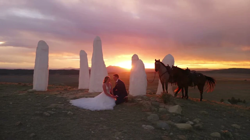 Wedding inspiration with a couple and horses among the six stones